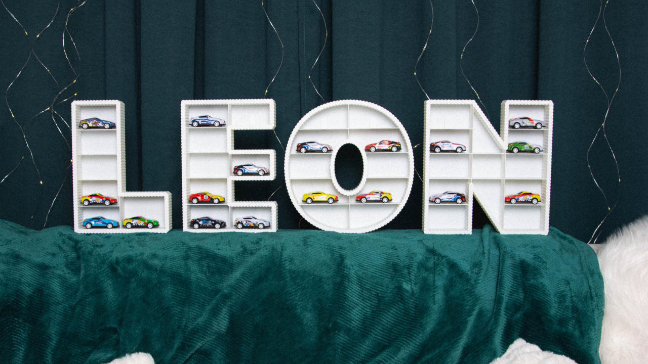 Personalized toy car display shelf with the name Leon for Hot Wheels and diecast car collection
